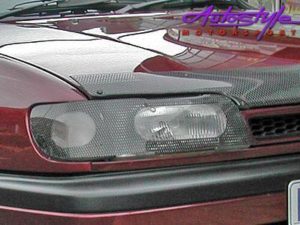 Opel Astra 2004 + Carbon Look Headlight Guard-0